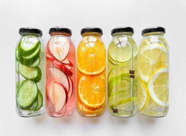 Fruit and vegetable-infused water in bottles