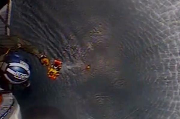 Coast Guard chopper rescues boater. 