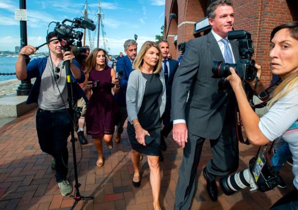 Lori Loughlin and husband Mossimo Giannulli after a pre-trial hearing in Boston on Aug. 27, 2019