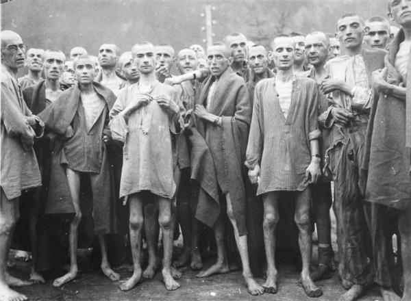 Emaciated people in a co<em></em>ncentration camp  