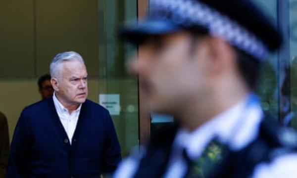 Former BBC news presenter Huw Edwards leaves court after his sentencing hearing.