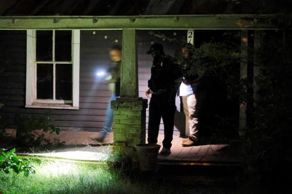 Secret Service and Homeland Security agents raiding Routh's Grensboro house on Sept. 15, 2024.