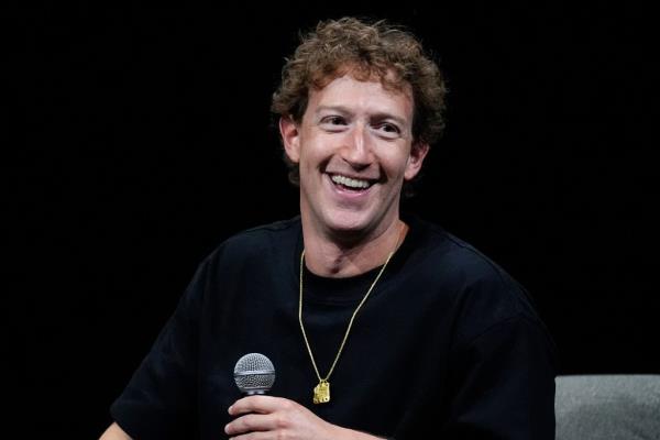 Mark Zuckerberg, CEO of me<em></em>ta, speaking at the SIGGRAPH 2024 co<em></em>nference with a microphone