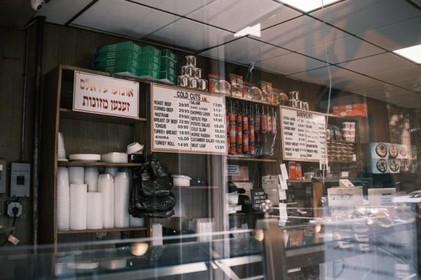 Gottlieb's famous Jewish deli in Williamsburg, Brooklyn, closed with a sign indicating closure due to the death of owner R' Shalom Yosef Gottlieb, September 18, 2024