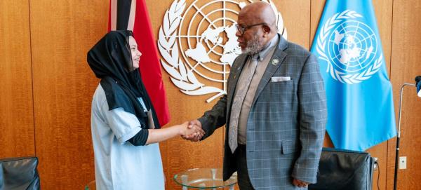 General Assembly President Dennis Francis (right) meets New York City school student Fariha Akter.