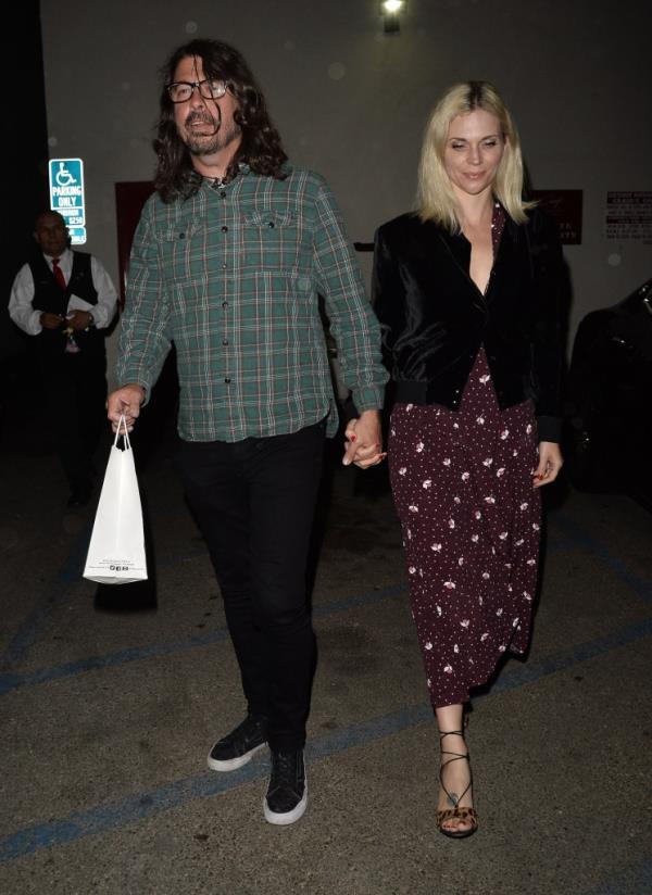 Dave Grohl and wife Jordyn Blum leave Craigs in 2017.