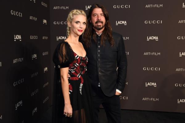 Jordyn Blum (L) and Dave Grohl in 2018.