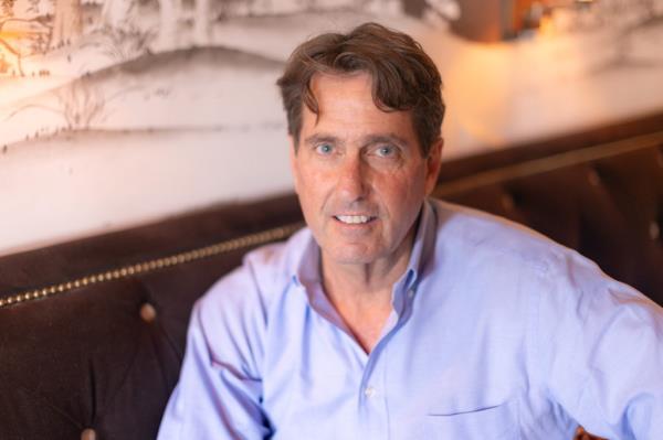 Curtis Bashaw, Republican candidate for NJ US Senate, sitting on a couch in the Brown Room of Co<em></em>ngress Hall in Cape May, New Jersey