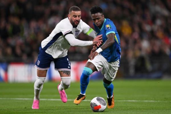 Kyle Walker and Vinicius Junior during England's defeat to Brazil at Wembley