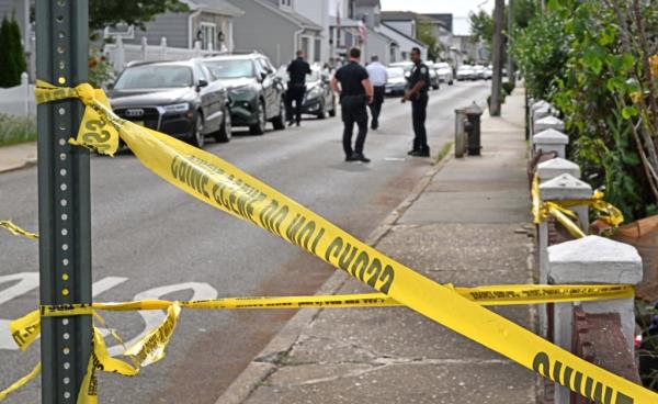 Police officers investigating the scene of the brawl in Brooklyn on Sept. 23, 2024.