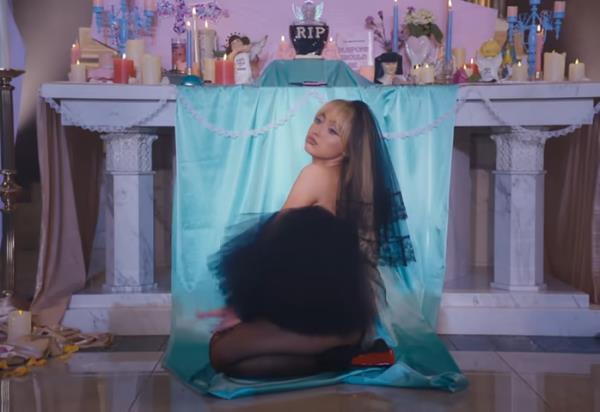 A still from Sabrina Carpenter's "Feather" music video, which she co<em></em>ntroversially filmed in a Brooklyn church.