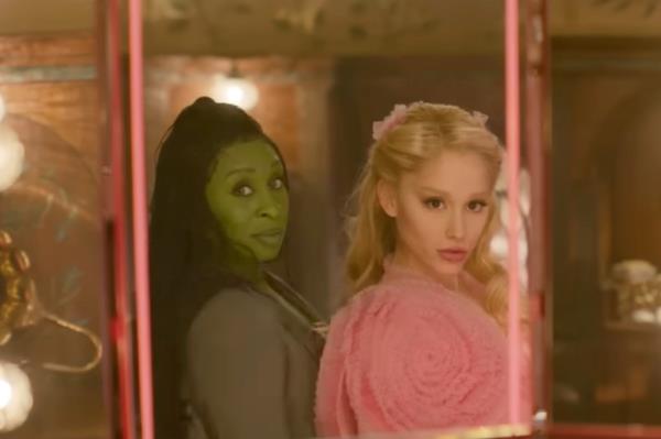 Ariana Grande as Glinda and Cynthia Erivo as Elphaba in the film "Wicked." 