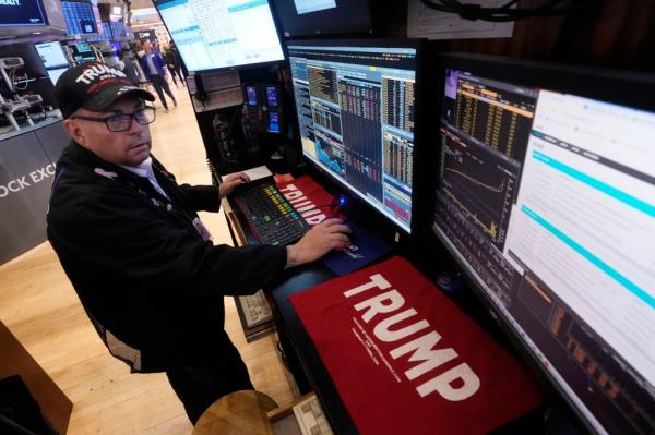 Trader Jo<em></em>nathan Mueller works on the floor of the New York Stock Exchange, Monday, Nov. 4, 2024.