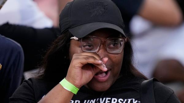 An attendee wipes away tears after Vice President Kamala Harris delivers a co<em></em>ncession speech for the 2024 presidential election on the campus of Howard University in Washington, Wednesday, Nov. 6, 2024. (AP Photo/Ben Curtis)