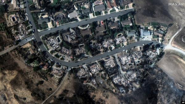 This satellite image released by Maxar Technologies shows fire-ravaged houses in Camarillo, Calif., Nov. 7, 2024. 