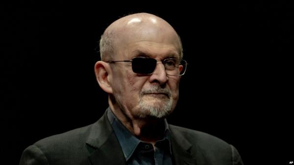 FILE - Salman Rushdie poses for a portrait to promote his book 'Knife: Meditations After an Attempted Murder' at the Deutsches Theater in Berlin, May 16, 2024. 