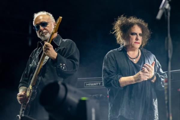 Reeves Gabrels (L) and Robert Smith of British rock band The Cure onstage