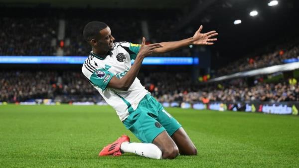 Alexander Isak celebrates his hat-trick as Newcastle hit Ipswich for four