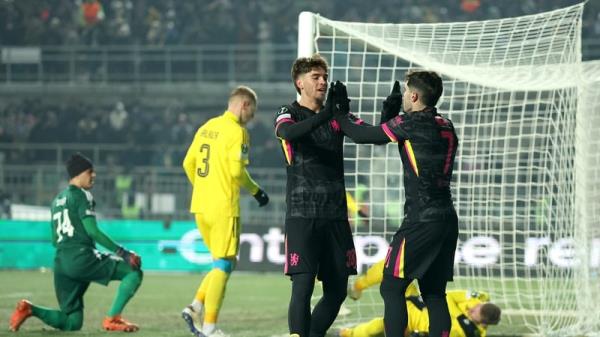 Marc Guiu celebrates scoring Chelsea's second goal with Pedro Neto