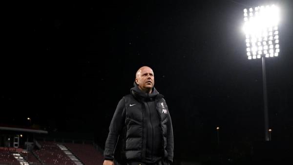 Arne Slot inspecting the Girona pitch earlier this evening