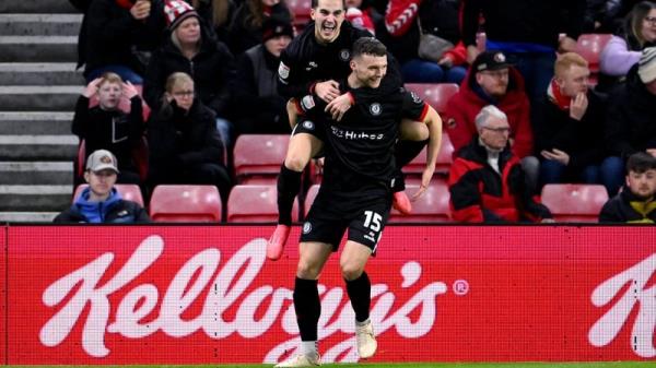 Luke McNally of Bristol City celebrates scoring