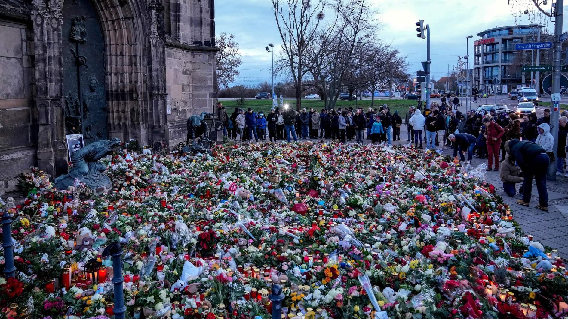 Germany pledges security inquest into Christmas market attack