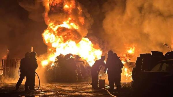 The fire department took nearly two hours to extinguish a blaze at a scrap collection centre in Taman Sungai Besi last night. — Picture via Facebook/Persatuan Bomba Sukarela Kawasan Kepong & Batu KL 