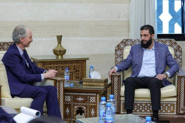 UN Special Envoy Geir Pedersen (left) speaks with Hayat Tahrir al-Sham leader Abu Mohammed al-Jolani, now using his real name Ahmed al-Sharaa, in Damascus on December 15, 2024. — Handout picture by the Syrian Interim Government via AFP