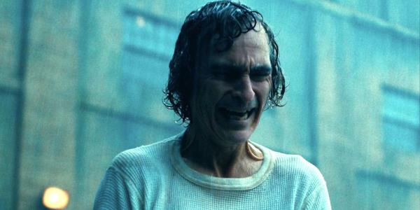 Joaquin Phoenix crying and laughing in Joker 2 Folie a Deux