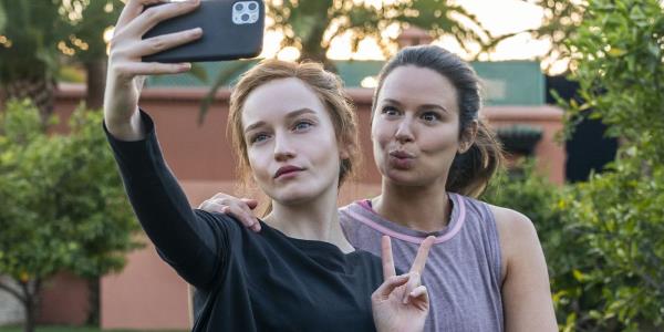 Anna Sorokin Delvey and Rachel Williams take a selfie together in Inventing Anna