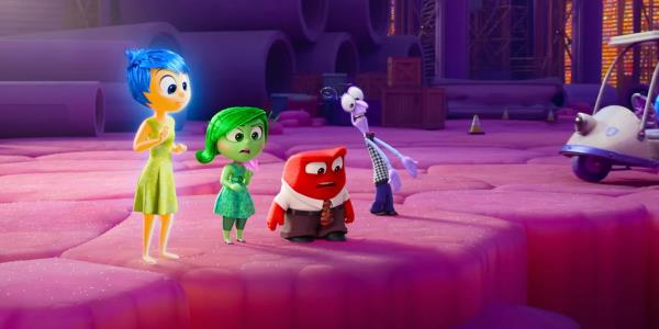 Joy, Disgust, Anger, and Sadness looking over a cliff in Inside Out 2