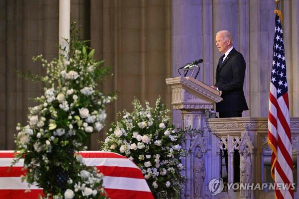 U.S. President Joe Biden delivers the eulogy at the state funeral service for former President Jimmy Carter at the Washington Natio<em></em>nal Cathedral in Washington on Jan. 9, 2025 in this photo released by AFP. (Yonhap)